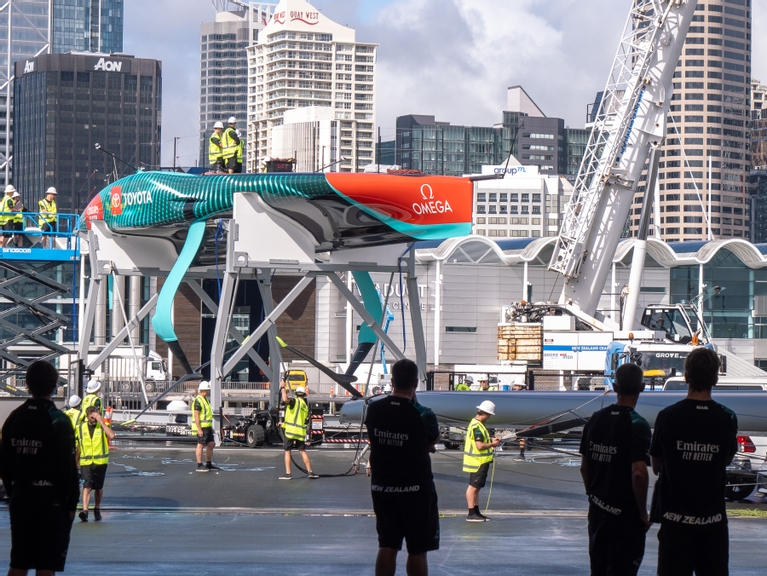 Emirates Team New Zealand new AC75 is rolled out of the shed for the first time in preparation for commissioning.